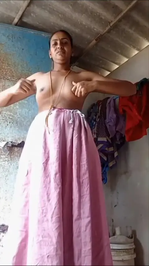 Tamil Bhabhi Shows Off Busty Charm
