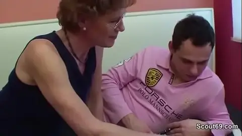 Mature Woman with Small Tits Enjoys Passionate Encounter with Young Men