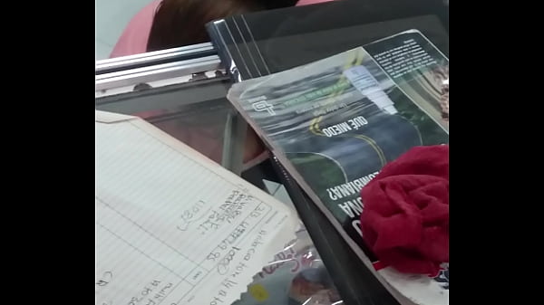 Mature Shopkeeper Exposes Busty Figure in Thong