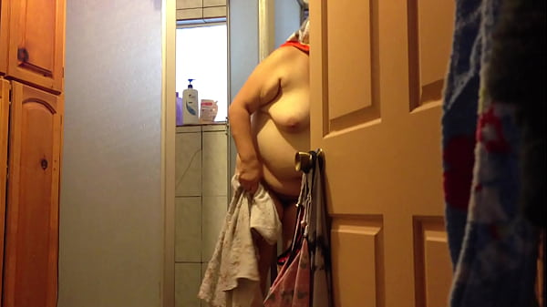 Mature Woman's Steamy After Shower Moment Caught