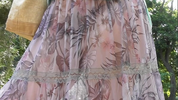 Mature Seductress in Transparent Dress Teases