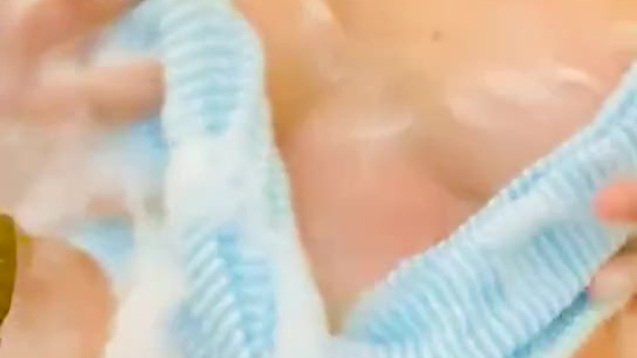 Sensual Mature Woman Enjoys Bathtub Tease