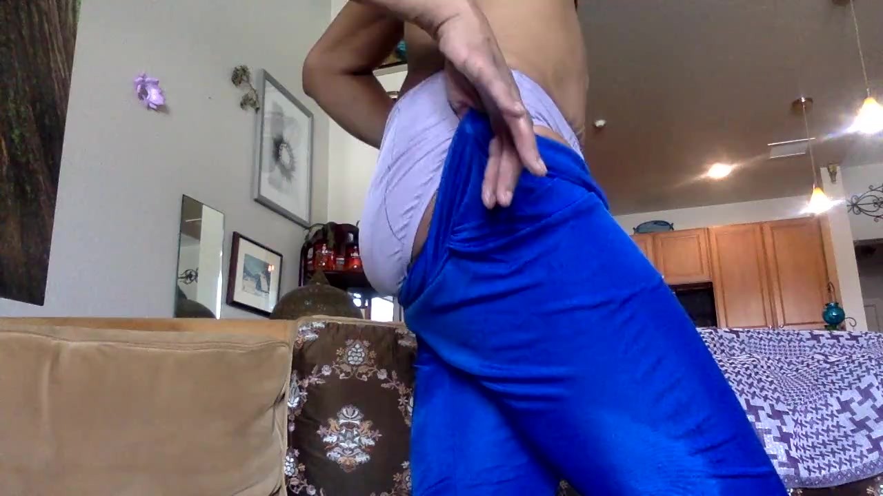 Ginger MILF in Blue Pants Teases with Boob Tie
