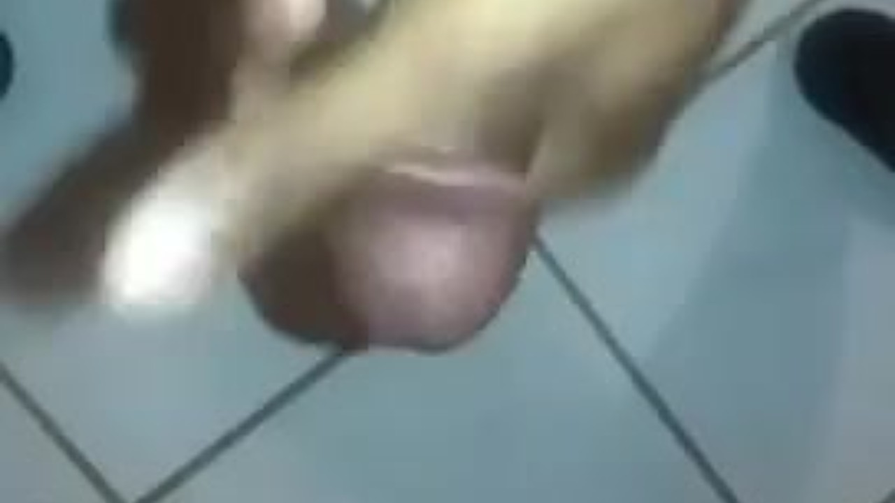 Masturbating