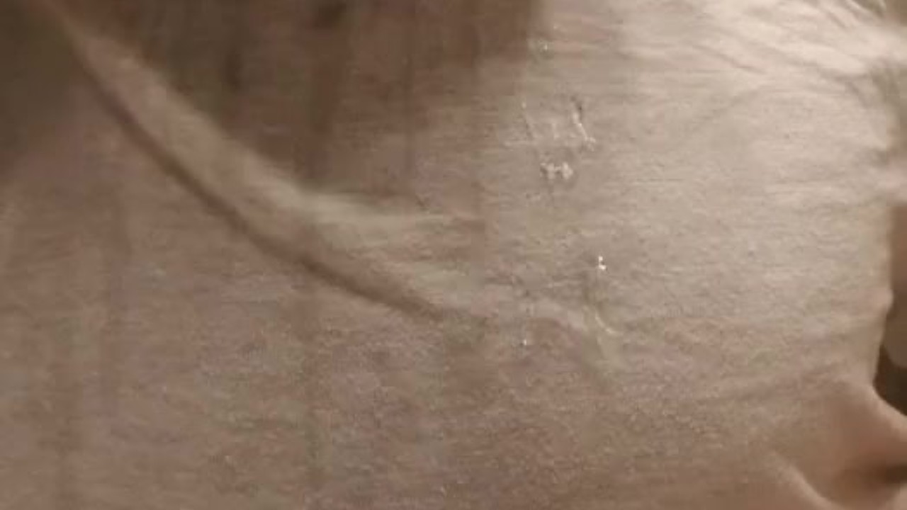 Mature Woman's Wet T-Shirt Reveals Hard Nipples