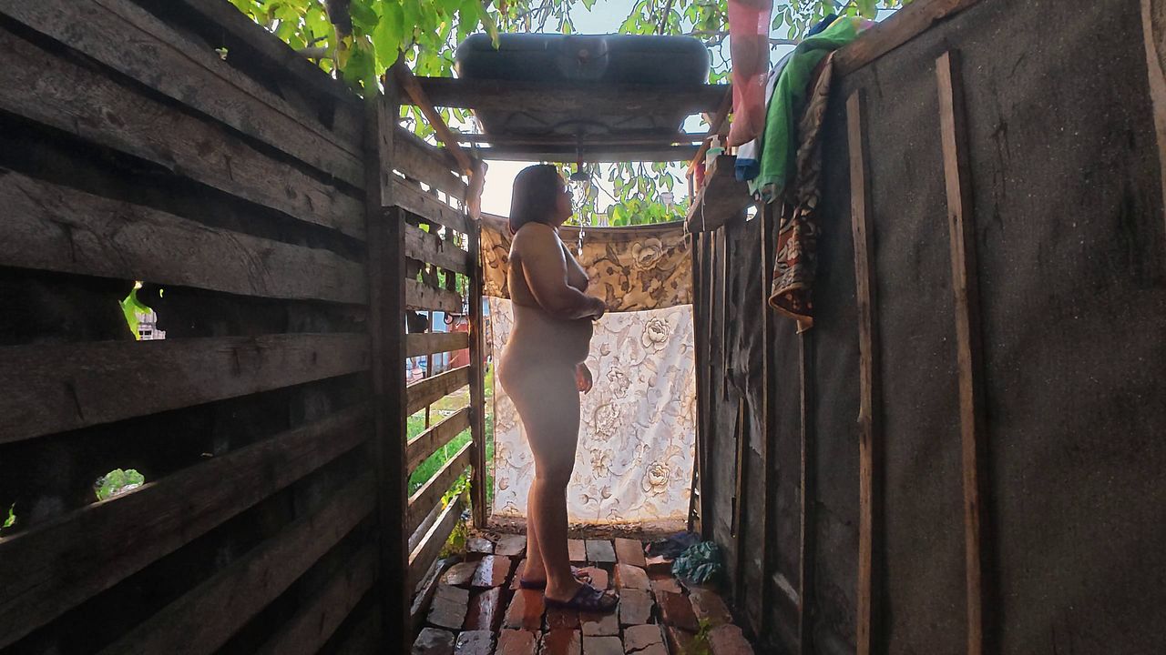 AllNaturalMe Outdoor Shower Session With Her Large Ass