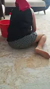 Stepmother in Hijab Cleans Carpets with Foot Fetish